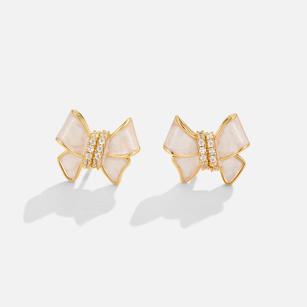 Noémie – Gold earrings with floral motif.