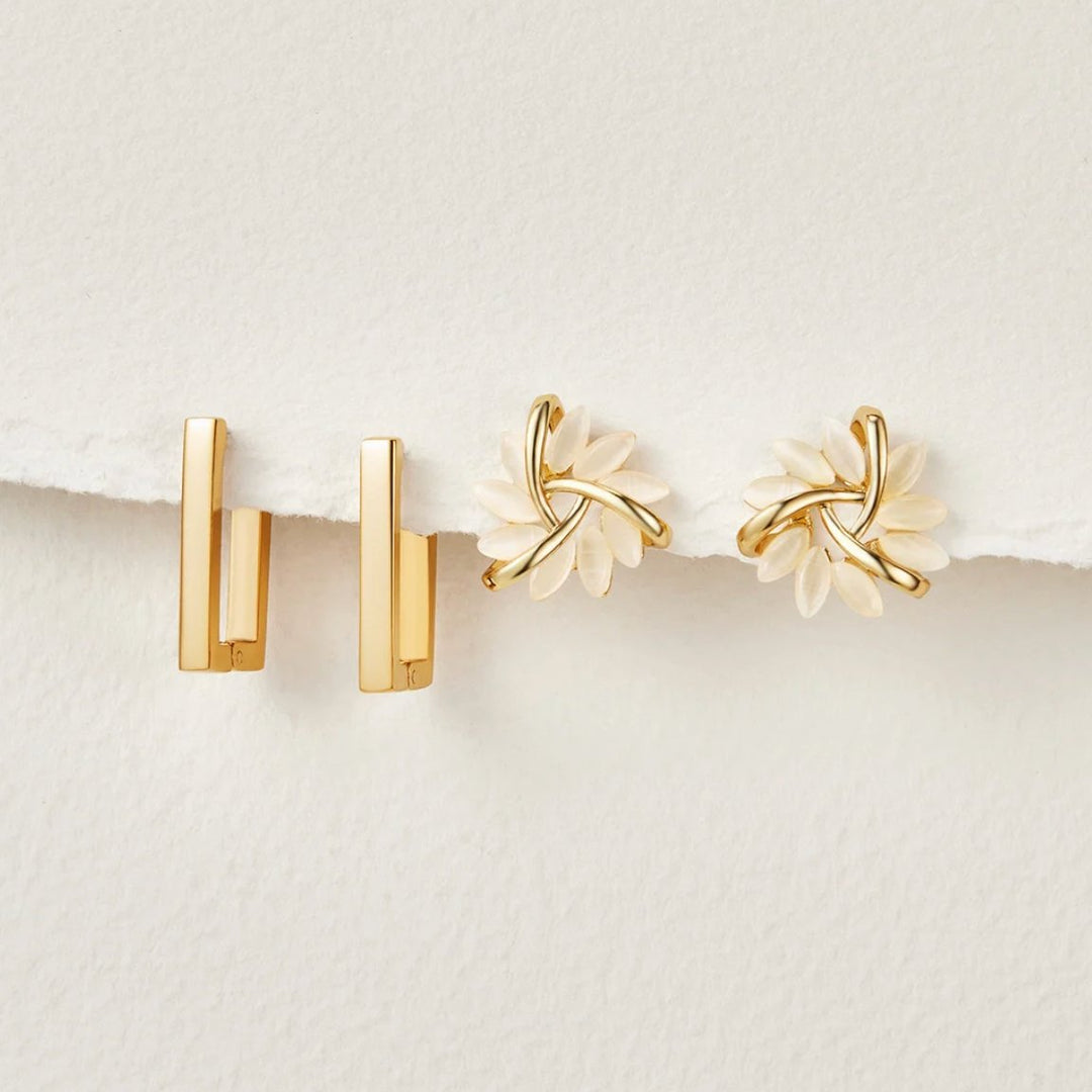 Céline – Gold earrings with geometric mix.